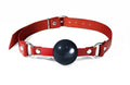Feral Feelings (Україна) Кляп силіконовий Feral Feelings Silicon Ball Gag Red/Black, червоний ремінець, чорна кулька