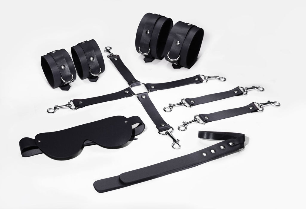 Feral Feelings (Україна) Набір Feral Feelings BDSM Kit 5 Black, наручники, поножі, хрестовина, маска, падл